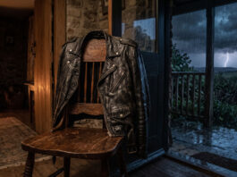 Behind the Track Writing Cold Rain on Black Leather